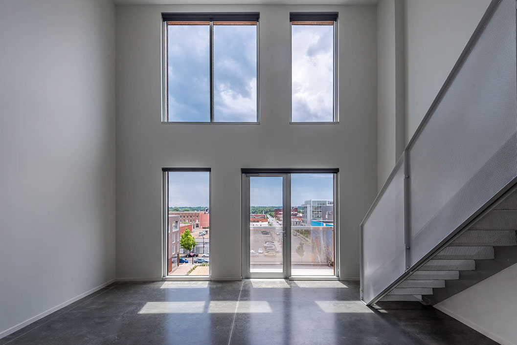 Interior image showcasing the towering wall of windows.